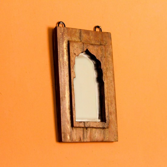 Reclaimed Wood Arch Mirror Frame Arched wooden mirror frame crafted from reclaimed wood with a natural weathered texture, featuring a carved base detail beneath the mirror inset.