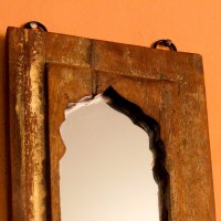 Reclaimed Wood Arch Mirror Frame Arched wooden mirror frame crafted from reclaimed wood with a natural weathered texture, featuring a carved base detail beneath the mirror inset.