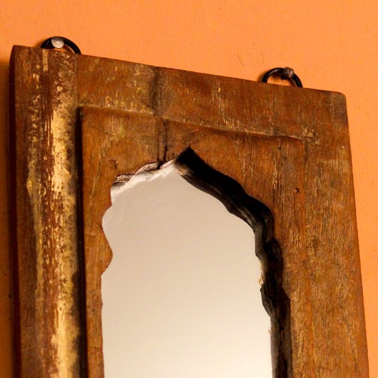 Reclaimed Wood Arch Mirror Frame Arched wooden mirror frame crafted from reclaimed wood with a natural weathered texture, featuring a carved base detail beneath the mirror inset.