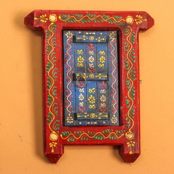 Small wooden window-shaped wall decor piece hand painted in deep red frame with a blue inner panel, featuring fine traditional motifs across the surface.