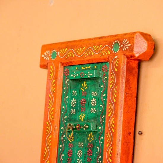 Hand Painted Orange & Green Wooden Jharokha Wall Decor Small wooden window-shaped wall decor piece hand painted in warm orange frame with a green inner panel, featuring fine traditional motifs across the surface.