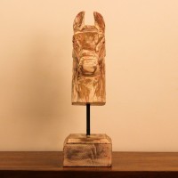 Rustic Pink Horse Head Sculpture Styled on Console Rustic pink-streaked wooden horse head sculpture on a stand, styled on a wooden console as a tabletop accent.