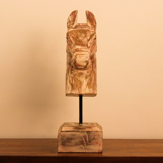 Rustic Pink Horse Head Sculpture Styled on Console Rustic pink-streaked wooden horse head sculpture on a stand, styled on a wooden console as a tabletop accent.