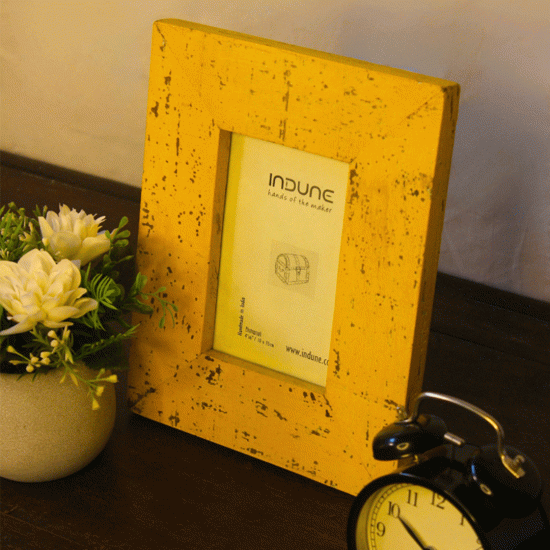 Handcrafted wooden photo frame in rough distressed yellow finish (4x6 inches) Handcrafted wooden photo frame in rough distressed yellow finish (4x6 inches)