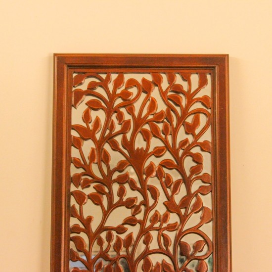 Sagwan wood leaf engraved wall mural hung on a warm wall above a console