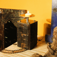 Reclaimed sleeper wood candle holder with iron detail – rustic table décor Reclaimed sleeper wood candle holder with iron detail – rustic table décor