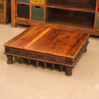 Large Carved Solid Wood Bajot with Hanging Lattu – Styled on Floor Large solid wood bajot styled on the floor in front of a wooden sideboard with colourful drawers