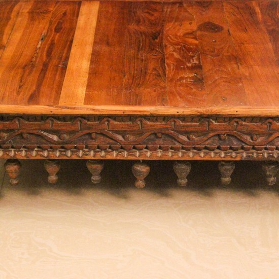 Large Carved Solid Wood Bajot with Hanging Lattu – Styled on Floor Large solid wood bajot styled on the floor in front of a wooden sideboard with colourful drawers