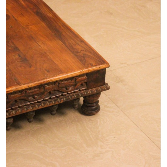 Large Carved Solid Wood Bajot with Hanging Lattu – Styled on Floor Large solid wood bajot styled on the floor in front of a wooden sideboard with colourful drawers