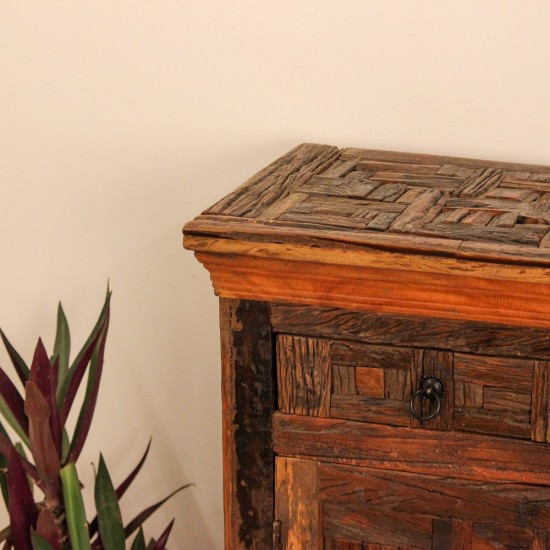 Reclaimed Sleeper Wood Cabinet with Drawers – Styled in Room Reclaimed sleeper wood cabinet styled in a living room beside a plant, with a painted décor piece on top