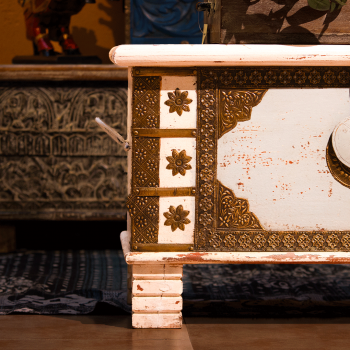 White-grey wooden treasure box with brass artwork front view – rustic storage trunk White-grey wooden treasure box with brass artwork front view – rustic storage trunk