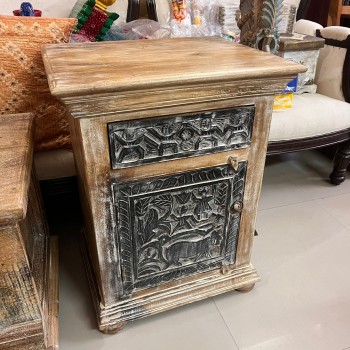 Hand-carved tribal art wooden bedside cabinet with intricate carvings Hand-carved tribal art wooden bedside cabinet with intricate carvings