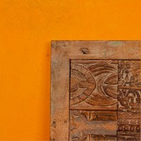 Antique reclaimed wooden mosaic wall panel made from old carved printing blocks for rustic heritage decor