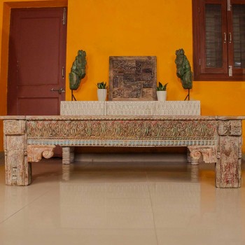Antique finish carved wooden bench with detailed floral and geometric motifs