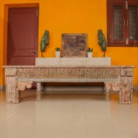 Antique finish carved wooden bench with detailed floral and geometric motifs