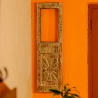 Reclaimed old wooden single window panel converted into rustic wall mirror with distressed vintage finish