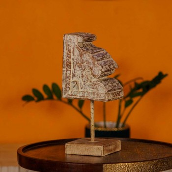 Small distressed white hand carved wooden block mounted on iron stand for vintage tabletop decor
