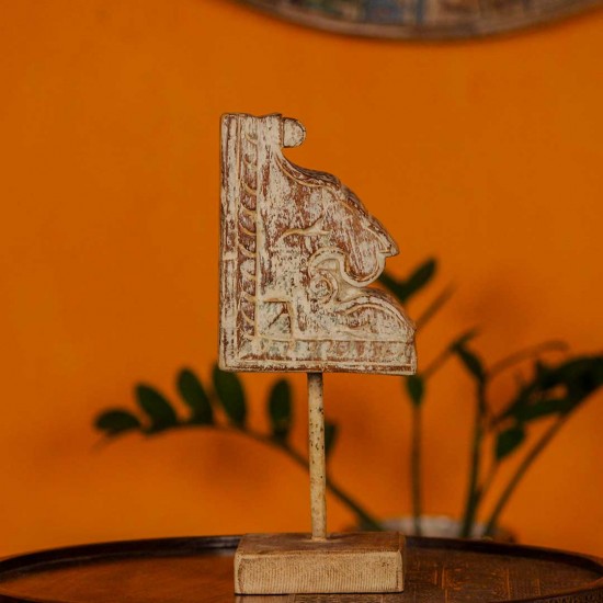 Small distressed white hand carved wooden block mounted on iron stand for vintage tabletop decor