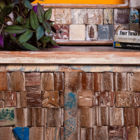 Reclaimed wood mosaic treasure box pitara – rustic wooden storage chest front view Reclaimed wood mosaic treasure box pitara – rustic wooden storage chest front view