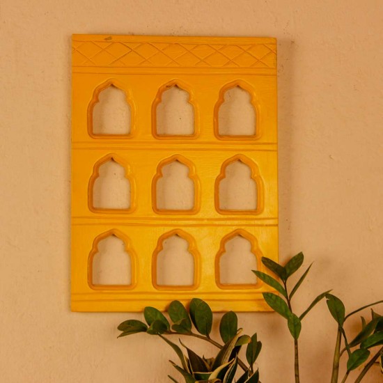 Bright yellow handcrafted 9 bari wall decor featuring traditional arch cutouts, perfect for adding a vibrant ethnic touch to walls.