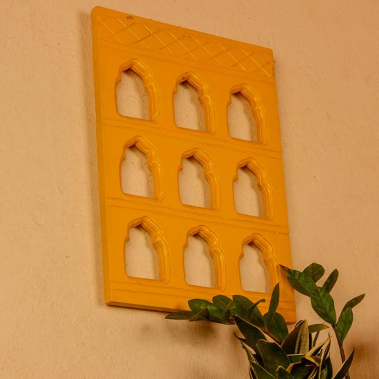 Bright yellow handcrafted 9 bari wall decor featuring traditional arch cutouts, perfect for adding a vibrant ethnic touch to walls.