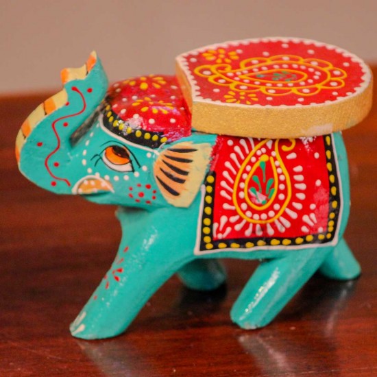 Small handpainted teal green elephant figurine with vibrant red and yellow detailing, designed in traditional Indian folk art style.