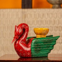 Decorative wooden duck in red and green finish with handpainted patterns and a small holder on top for table styling.