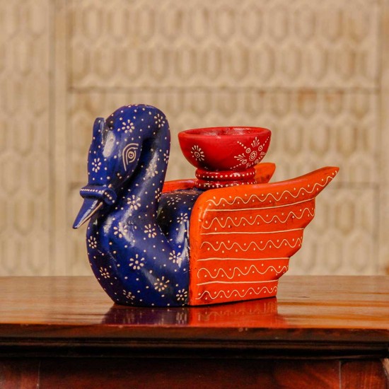 Decorative wooden duck in blue and orange finish with intricate handpainted patterns and a utility holder on top.