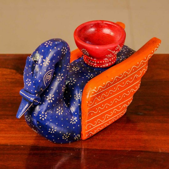 Decorative wooden duck in blue and orange finish with intricate handpainted patterns and a utility holder on top.