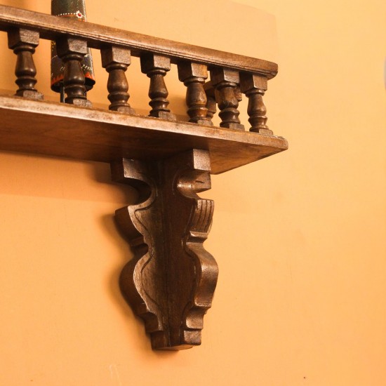 Hand Carved Wooden Wall Shelf Dark Polish Vintage | Indian Handicraft Home Decor Handcrafted dark polish wooden wall shelf with turned spindle detailing and carved apron, a vintage Indian heritage decor piece.