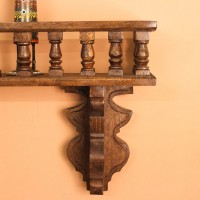 Hand Carved Wooden Wall Shelf Dark Polish Vintage | Indian Handicraft Home Decor Handcrafted dark polish wooden wall shelf with turned spindle detailing and carved apron, a vintage Indian heritage decor piece.