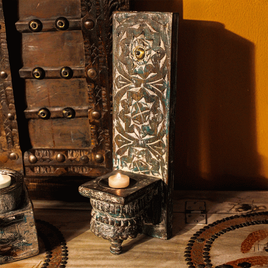 Hand-carved distressed white wooden wall candle holder with vintage finish Hand-carved distressed white wooden wall candle holder with vintage finish