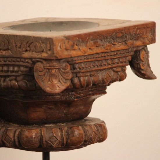 Vintage Carved Wooden Candle Holder with Stand – Styled on Wall Vintage carved wooden candle holder on iron stand styled on a console against a warm wall