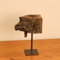 Distressed Wooden Bracket Candle Holder with Stand – Styled on Wall Distressed wooden bracket candle holder on stand styled on a console against a warm wall