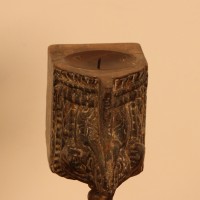 Distressed Wooden Bracket Candle Holder with Stand – Styled on Wall Distressed wooden bracket candle holder on stand styled on a console against a warm wall