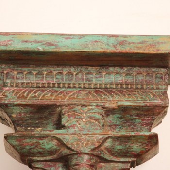 Antique Wooden Wall Shelf – Green Genuine antique wooden wall shelf with a weathered green-toned top plank set on a carved pedestal base with a floral medallion motif.