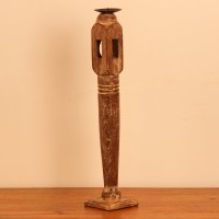 Repurposed Wooden Pillar Candle Stand – Whitewash Candle stand crafted from a repurposed antique bed leg, turned into a slender pillar form with a whitewashed distressed finish and a black metal candle plate on top.