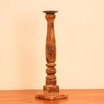 Repurposed Wooden Pillar Candle Stand – Natural Candle stand crafted from a repurposed antique bed leg, turned into a compact pillar form with a natural wood finish and a black metal candle plate on top.