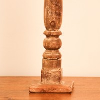 Repurposed Wooden Pillar Candle Stand – Natural Candle stand crafted from a repurposed antique bed leg, turned into a compact pillar form with a natural wood finish and a black metal candle plate on top.