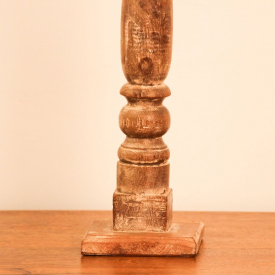 Repurposed Wooden Pillar Candle Stand – Natural Candle stand crafted from a repurposed antique bed leg, turned into a compact pillar form with a natural wood finish and a black metal candle plate on top.