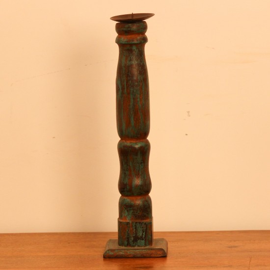 Repurposed Wooden Pillar Candle Stand – Distressed Green Candle stand crafted from a repurposed antique bed leg, turned into a slender pillar form with a distressed green finish and a black metal candle plate on top.