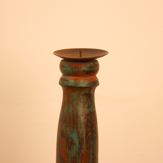 Repurposed Wooden Pillar Candle Stand – Distressed Green Candle stand crafted from a repurposed antique bed leg, turned into a slender pillar form with a distressed green finish and a black metal candle plate on top.