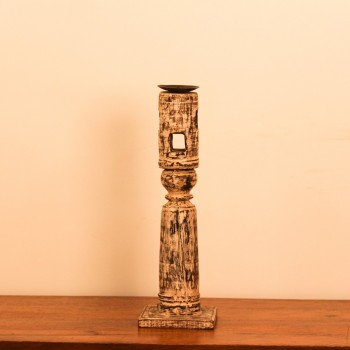 Repurposed Wooden Pillar Candle Stand – White Distressed Tall candle stand crafted from a repurposed antique bed leg, finished in a white distressed tone with turned detailing and a black metal candle plate on top.