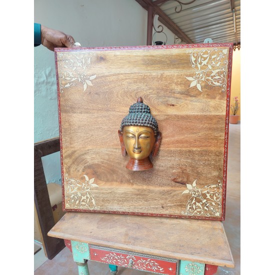 Brass Buddha on Wooden Panel Brass Buddha on Wooden Panel