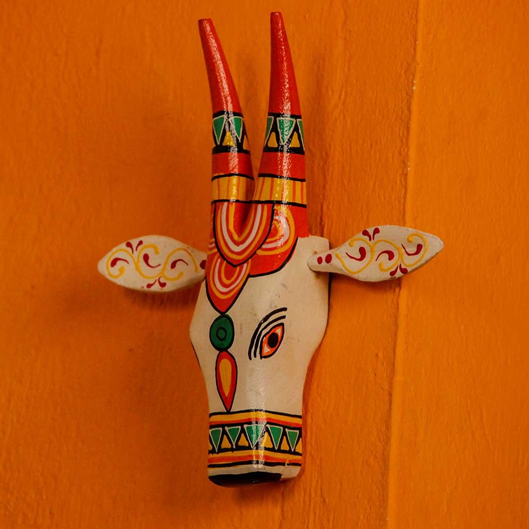Hand Painted Wooden Cow Face Wall Decor – White & Orange